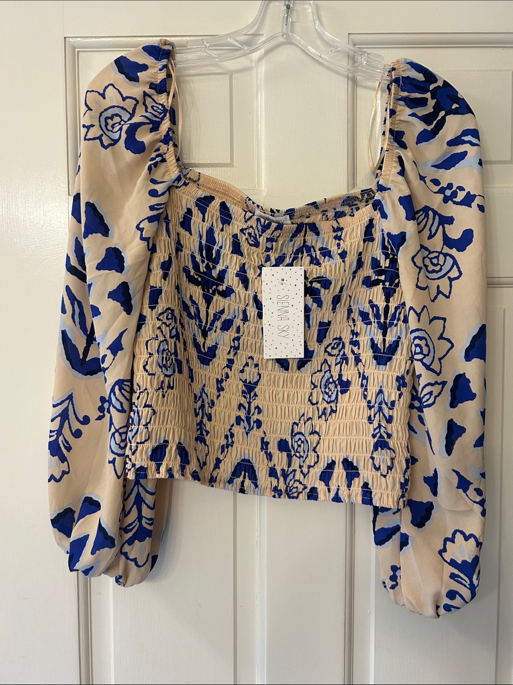 NWT Sienna Sky cream smocked cropped blouse, blue shades and floral Print